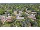 An aerial shot showcasing a neighborhood with tree-lined streets and well-maintained homes at 3775 S Poplar St, Denver, CO 80237