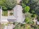 Overhead view of home featuring manicured landscaping, a lush lawn, and tree coverage in a neighborhood at 3775 S Poplar St, Denver, CO 80237