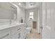 Modern bathroom featuring a large vanity, neutral color palette, and updated fixtures at 3775 S Poplar St, Denver, CO 80237