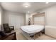 Stylish home office features a Murphy bed that transforms into a bedroom at 652 Ulster Way, Denver, CO 80230