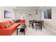 Cozy living room with stylish furniture, bright decor and modern lighting fixtures at 652 Ulster Way, Denver, CO 80230