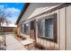 Charming home exterior features a quaint entrance and rock landscaping at 16035 E Ithaca Pl # D, Aurora, CO 80013