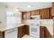 Functional kitchen featuring bright countertops and essential appliances at 16035 E Ithaca Pl # D, Aurora, CO 80013