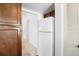 Kitchen area with ample cabinet space and modern white refrigerator at 16035 E Ithaca Pl # D, Aurora, CO 80013
