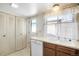 Practical kitchen area with dishwasher, double sink and ample storage at 16035 E Ithaca Pl # D, Aurora, CO 80013