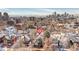 Aerial view of Victorian-era home in Denver with cityscape in the background at 1435 Vine St # 2, Denver, CO 80206