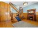 Grand foyer boasts a staircase with detailed wood trim, a fireplace, and hardwood floors at 1435 Vine St # 2, Denver, CO 80206