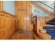 Entrance foyer with staircase and detailed wood trim and flooring at 1435 Vine St # 2, Denver, CO 80206