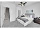 Cozy bedroom with neutral carpet, bright windows, and steps at 2680 Blake St # 13, Denver, CO 80205