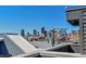 Expansive city view from the rooftop deck, showcasing the Denver skyline against a clear sky at 2680 Blake St # 13, Denver, CO 80205