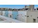 Exterior view of modern townhomes featuring multi-tone finishes and well-maintained roofing at 2680 Blake St # 13, Denver, CO 80205