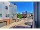 Modern townhomes showcasing unique architectural details and views of a landscaped community at 2680 Blake St # 13, Denver, CO 80205