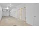 Well-lit garage featuring a roll-up door, storage and bright lighting, offering parking and utility space at 2680 Blake St # 13, Denver, CO 80205