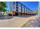 Row of garages below modern condos, showcasing convenience and extra storage space at 2680 Blake St # 13, Denver, CO 80205