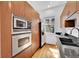 Well-equipped kitchen features stainless steel appliances and ample cabinet space at 2680 Blake St # 13, Denver, CO 80205