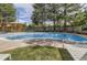 Inviting community pool with lounge chairs, clear water, and lush greenery creating a serene oasis at 5555 E Briarwood Ave # 706, Centennial, CO 80122