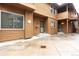 Exterior view showcasing the home's entrance with well-kept landscaping and a welcoming facade at 5555 E Briarwood Ave # 706, Centennial, CO 80122