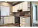 Efficient kitchen design with stainless steel appliances and ample cabinet space at 5555 E Briarwood Ave # 706, Centennial, CO 80122
