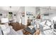 Inviting living room featuring hardwood floors and neutral tones at 10795 E Powers Dr, Englewood, CO 80111