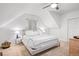Spacious primary bedroom with a large bed and closet at 950 Tenderfoot Dr, Larkspur, CO 80118