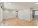 Open concept living room with hardwood floors, recessed lighting and neutral paint at 7020 Canosa Ct, Westminster, CO 80030