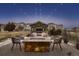 A spacious backyard and patio, perfect for relaxing and outdoor fun with friends and Gathering at 2618 S Kilmer Ct, Denver, CO 80228