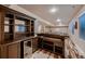 This finished basement features a bar area, adding a touch of luxury to your home at 2618 S Kilmer Ct, Denver, CO 80228