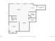 Basement floorplan featuring a living room, bedroom, bathroom, utility closet, bar, and storage at 2618 S Kilmer Ct, Denver, CO 80228