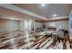 This expansive basement features stylish flooring and provides plenty of space for relaxing and entertaining at 2618 S Kilmer Ct, Denver, CO 80228