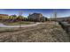 Community park with a playground, walking path, and open green space for residents to enjoy outdoor activities at 2618 S Kilmer Ct, Denver, CO 80228