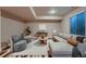 A cozy living room area is decorated with modern furniture, providing a relaxing place to gather at 2618 S Kilmer Ct, Denver, CO 80228