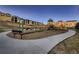 Community playground featuring swings, slides, and climbing structures for children to enjoy outdoor recreation at 2618 S Kilmer Ct, Denver, CO 80228