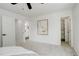 Bright bedroom with neutral colors, soft carpet and an ensuite bathroom and large closet at 21486 E Crestline Ln, Centennial, CO 80015