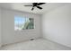 A bright and airy room with a large window offering exterior views and natural light at 21486 E Crestline Ln, Centennial, CO 80015