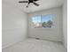 Bright and airy room with a large window offering exterior views and natural light at 21486 E Crestline Ln, Centennial, CO 80015