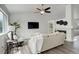 Inviting living area showcasing a fireplace, built-in shelving, and stylish decor at 21486 E Crestline Ln, Centennial, CO 80015