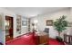 Inviting home office featuring custom built-in bookshelves and a classic desk, perfect for remote work or study at 718 Locust St, Denver, CO 80220