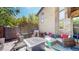 Charming patio with outdoor seating, grill, and landscaped surroundings, perfect for relaxing at 718 Locust St, Denver, CO 80220