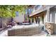 Outdoor patio with comfortable seating, fire pit, and lush landscaping, perfect for entertaining at 718 Locust St, Denver, CO 80220