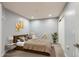Serene bedroom with a queen-size bed, soft lighting, and a neutral color palette at 975 N Lincoln St # 4I, Denver, CO 80203