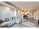 Inviting living room with a comfortable gray sofa and modern decor at 975 N Lincoln St # 4I, Denver, CO 80203