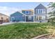 Spacious backyard with lush green lawn, perfect for outdoor activities and relaxation at 17294 W 60Th Ct, Arvada, CO 80403