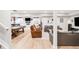 Finished basement with a pool table, bar seating, and a comfortable entertainment area at 17294 W 60Th Ct, Arvada, CO 80403