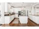 Bright kitchen featuring granite countertops, stainless appliances, and lots of storage at 17294 W 60Th Ct, Arvada, CO 80403