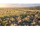 Aerial view of a residential neighborhood, showcasing well-maintained homes and green spaces at 17294 W 60Th Ct, Arvada, CO 80403