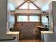 Modern tiled shower with dual shower heads, mosaic accents, and granite trim at 2418 W Euclid Ave, Littleton, CO 80120