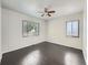 Bright bedroom with hardwood floors, natural light and ceiling fan at 2865 S Fairfax St, Denver, CO 80222