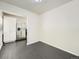 Cozy dining room area featuring wood floors and stainless steel refrigerator at 2865 S Fairfax St, Denver, CO 80222
