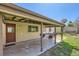 Covered patio with built-in grill area, perfect for outdoor entertaining at 2865 S Fairfax St, Denver, CO 80222