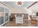 Open dining area with rustic wood paneling and room to entertain guests at 381 El Paso Ct, Denver, CO 80221